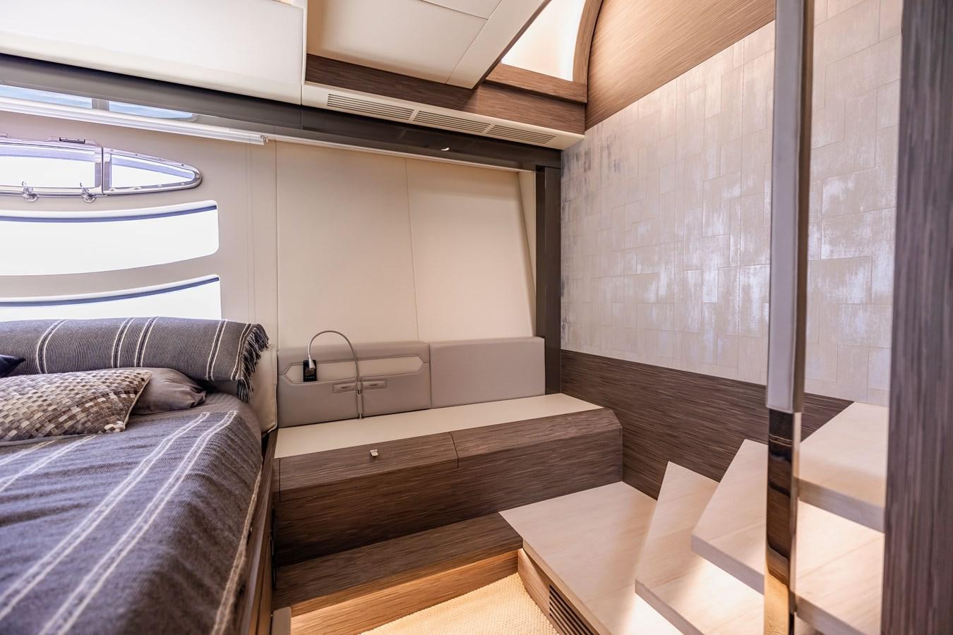 a room with a bed and a window aboard DOUBLE OR NOTHING Yacht for Sale