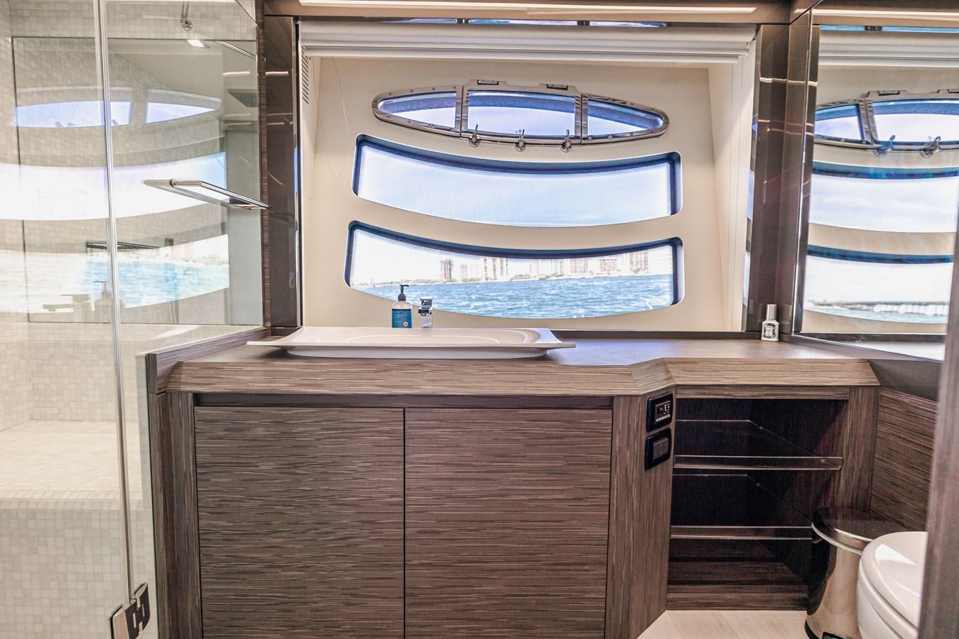 a room with a large window aboard DOUBLE OR NOTHING Yacht for Sale