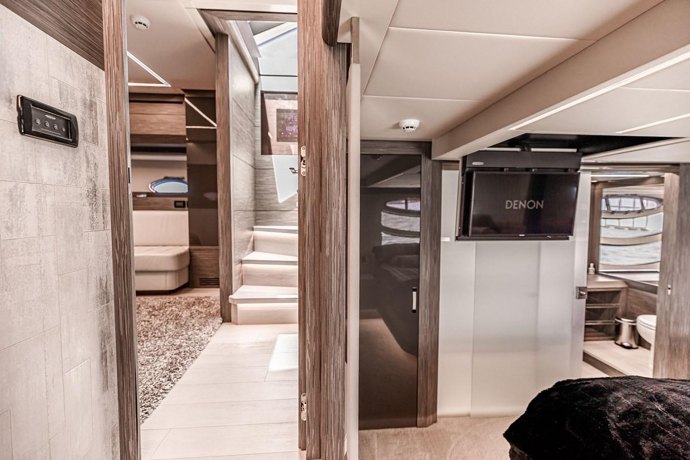 a bathroom with a wood door aboard DOUBLE OR NOTHING Yacht for Sale