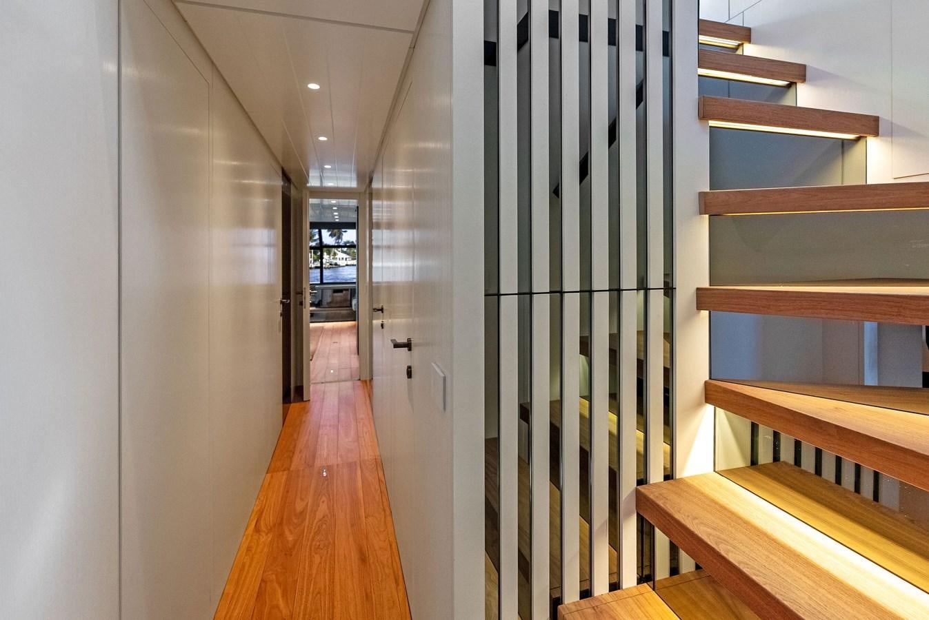 a hallway with wooden floors aboard SNACK MONEY Yacht for Sale