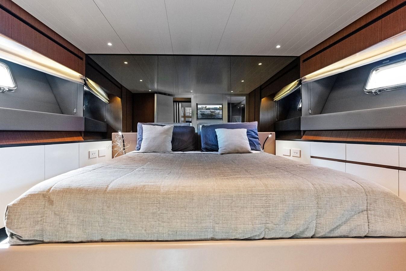 a bed with pillows aboard SNACK MONEY Yacht for Sale