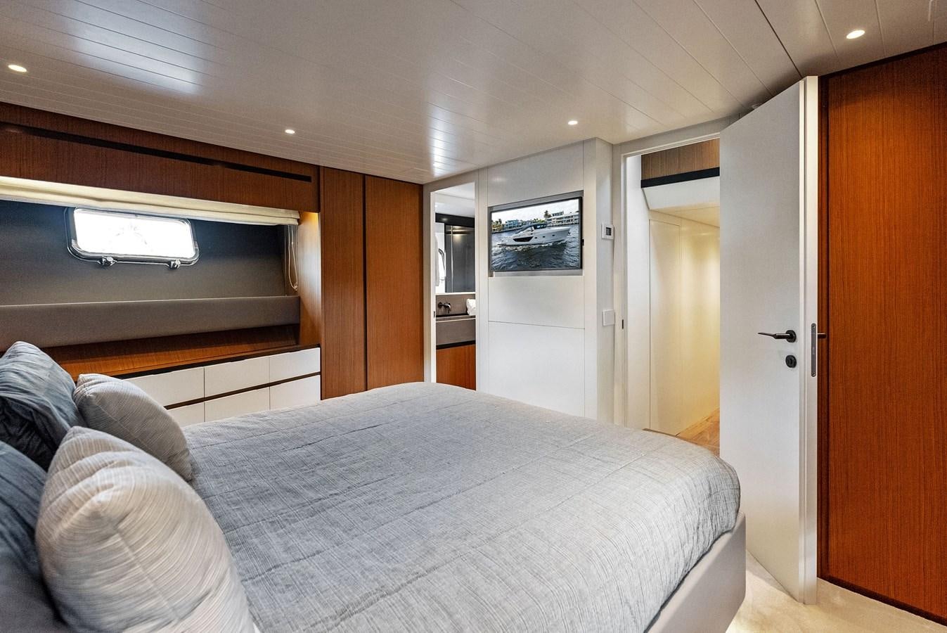 a bed in a room aboard SNACK MONEY Yacht for Sale