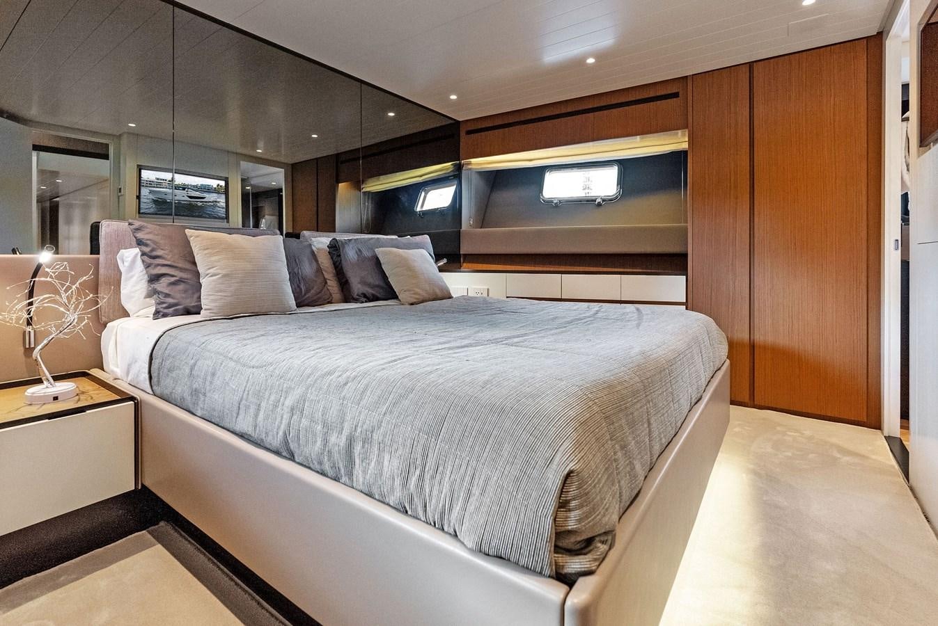 a bed in a room aboard SNACK MONEY Yacht for Sale