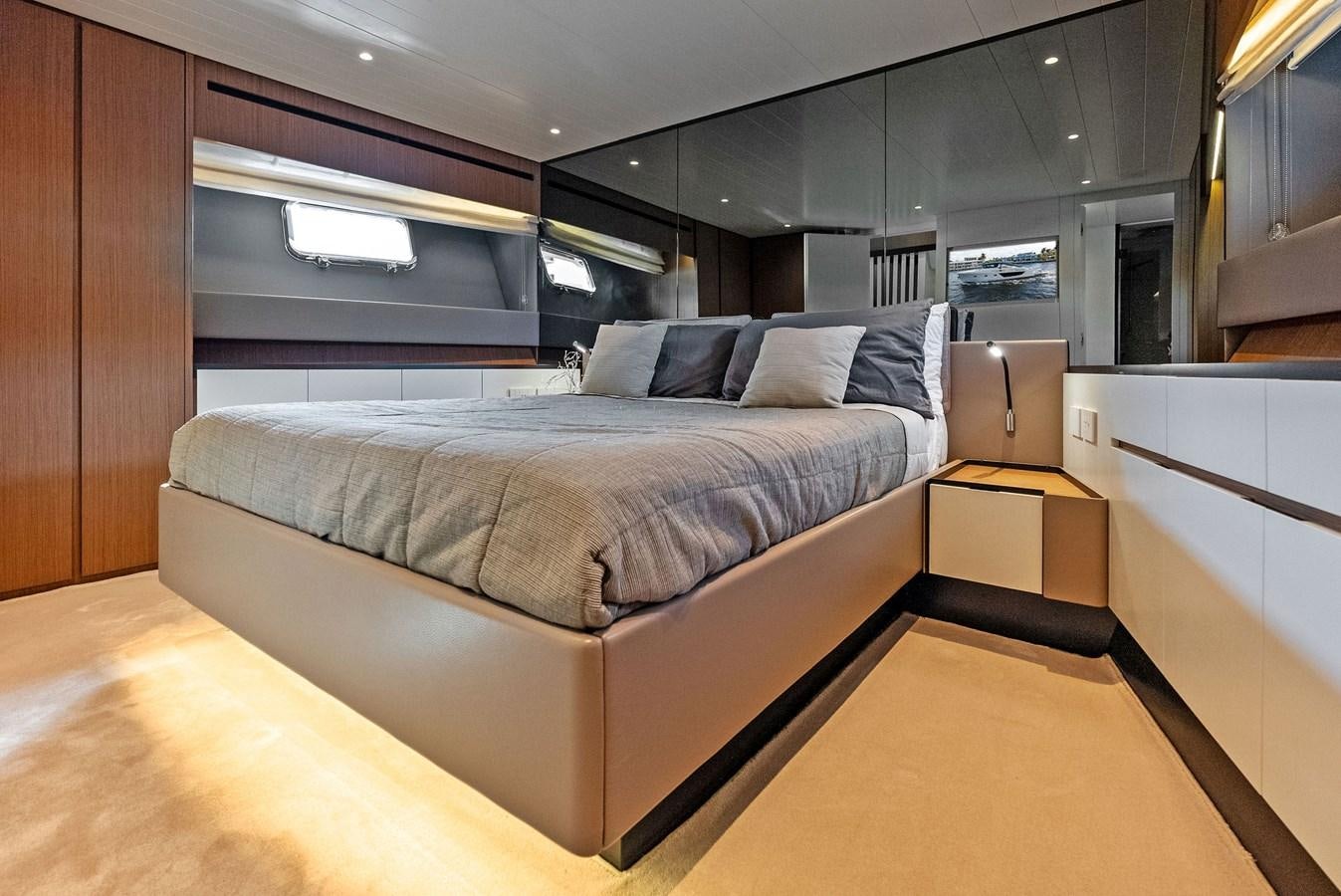 a bed in a room aboard SNACK MONEY Yacht for Sale