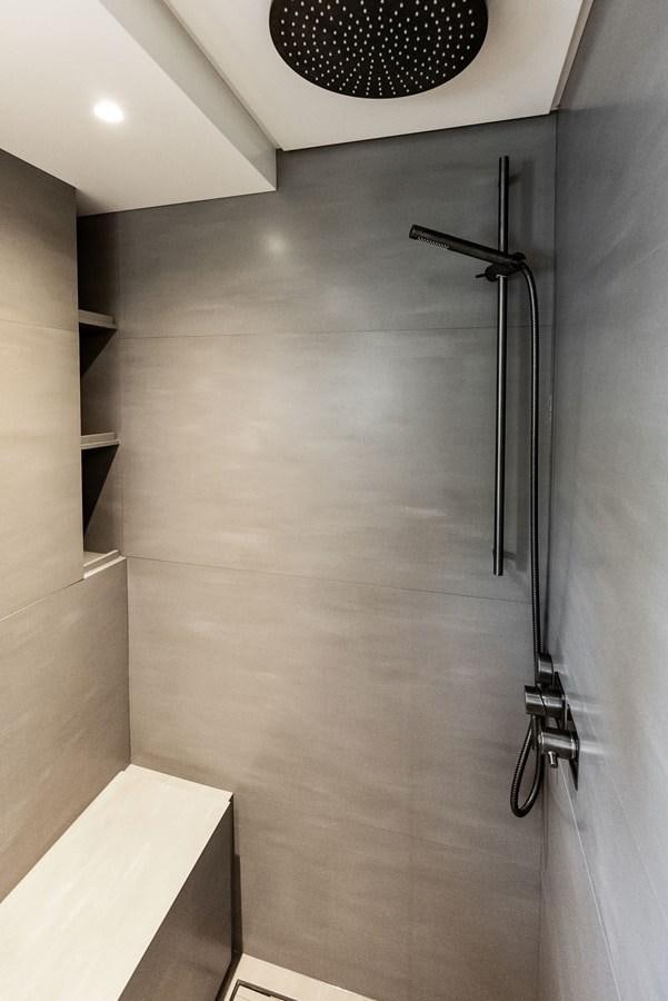 a shower unit with a black hose aboard SNACK MONEY Yacht for Sale