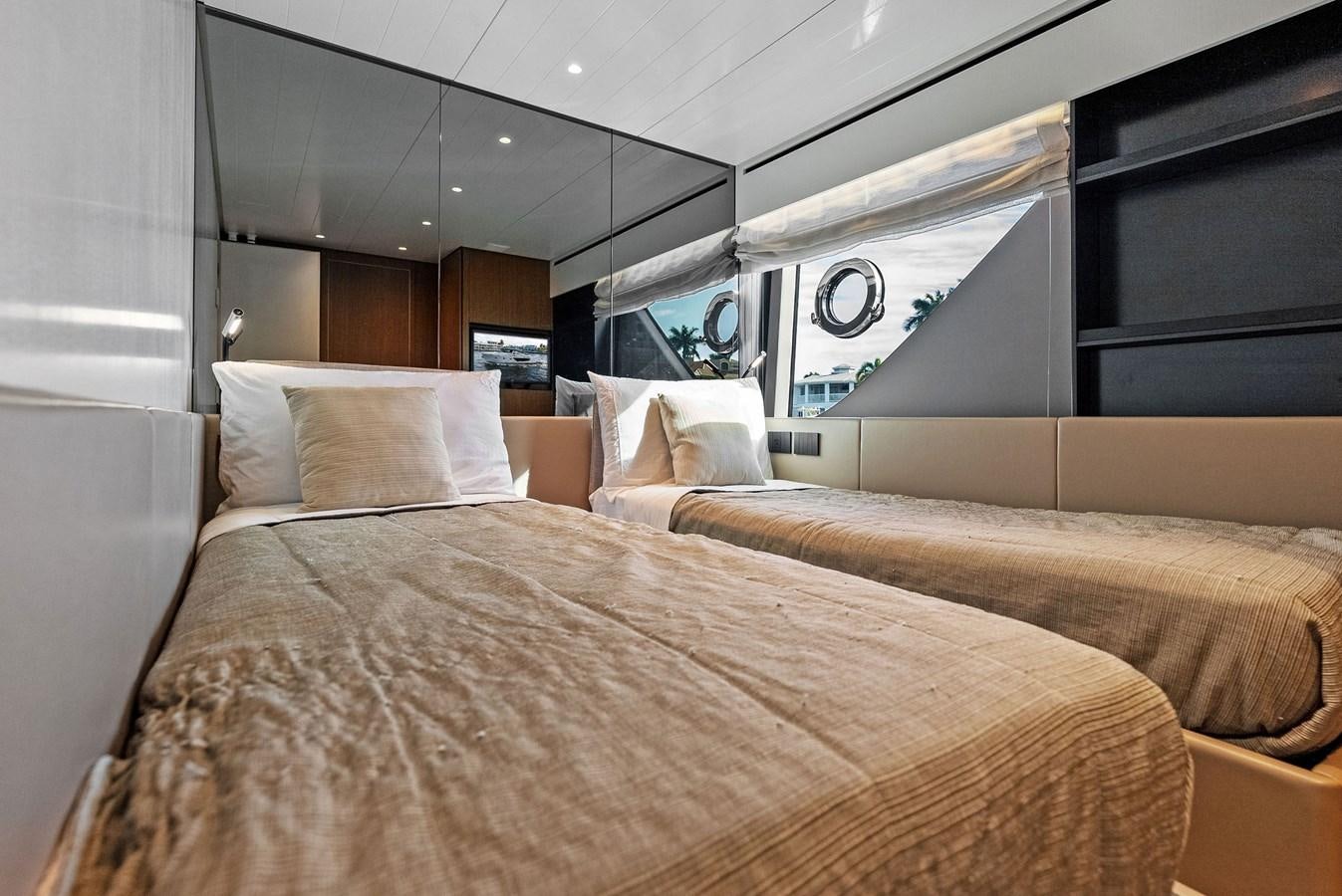 a bed with a large bed aboard SNACK MONEY Yacht for Sale