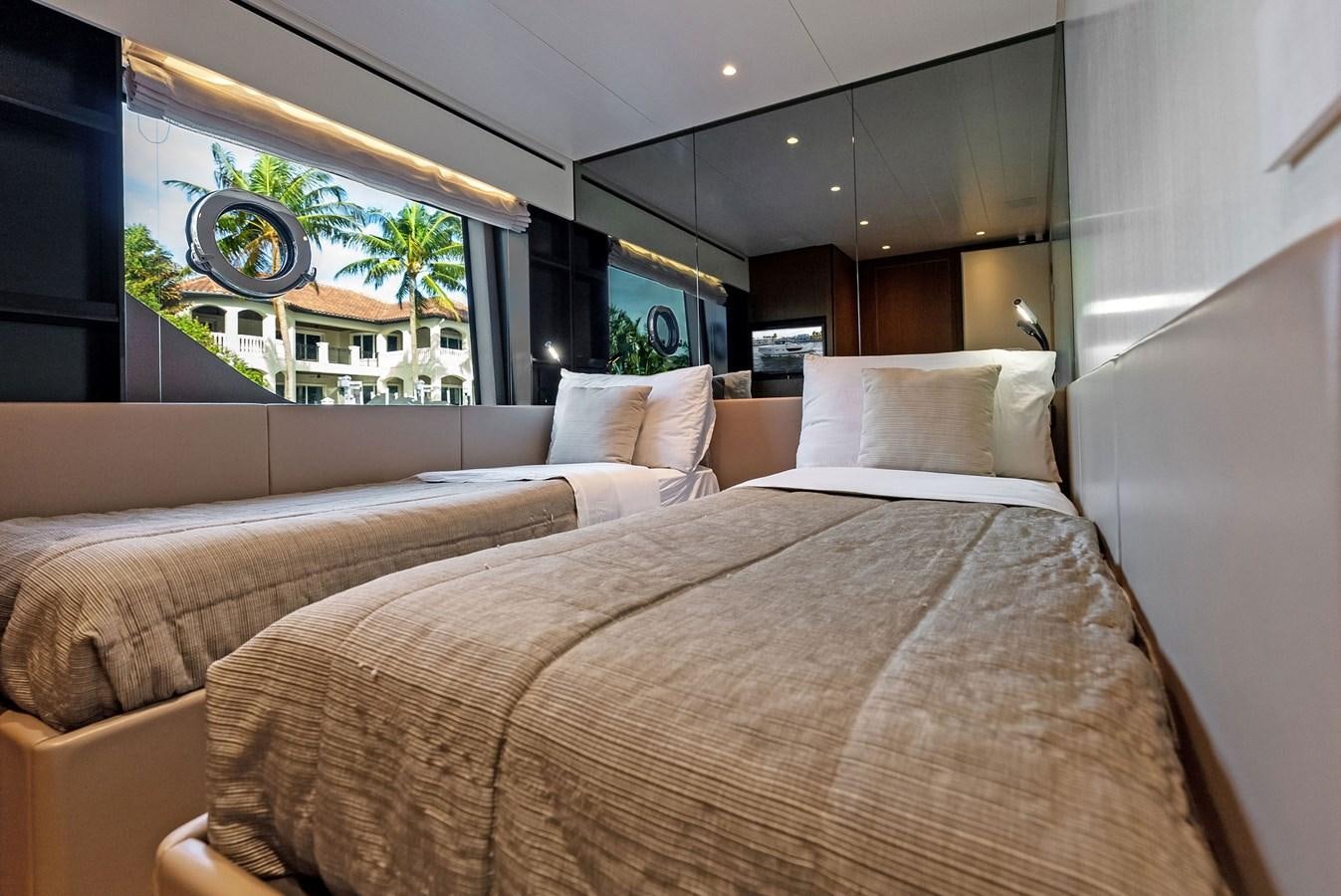 a bed with a large bed aboard SNACK MONEY Yacht for Sale