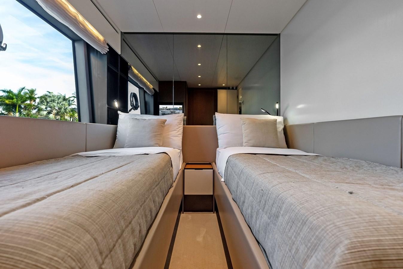 a couple of beds in a room aboard SNACK MONEY Yacht for Sale
