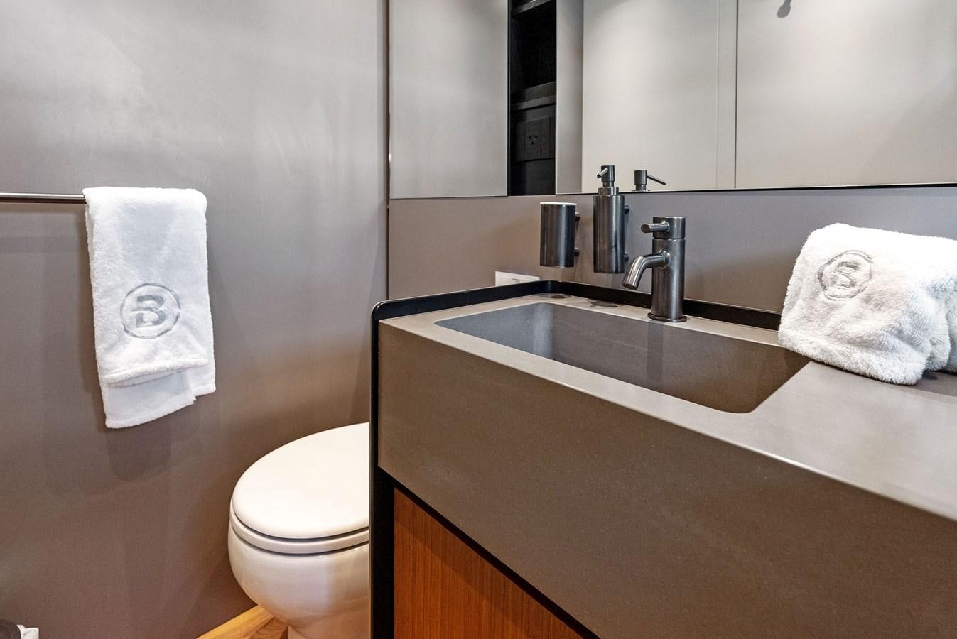 a bathroom with a sink and toilet aboard SNACK MONEY Yacht for Sale