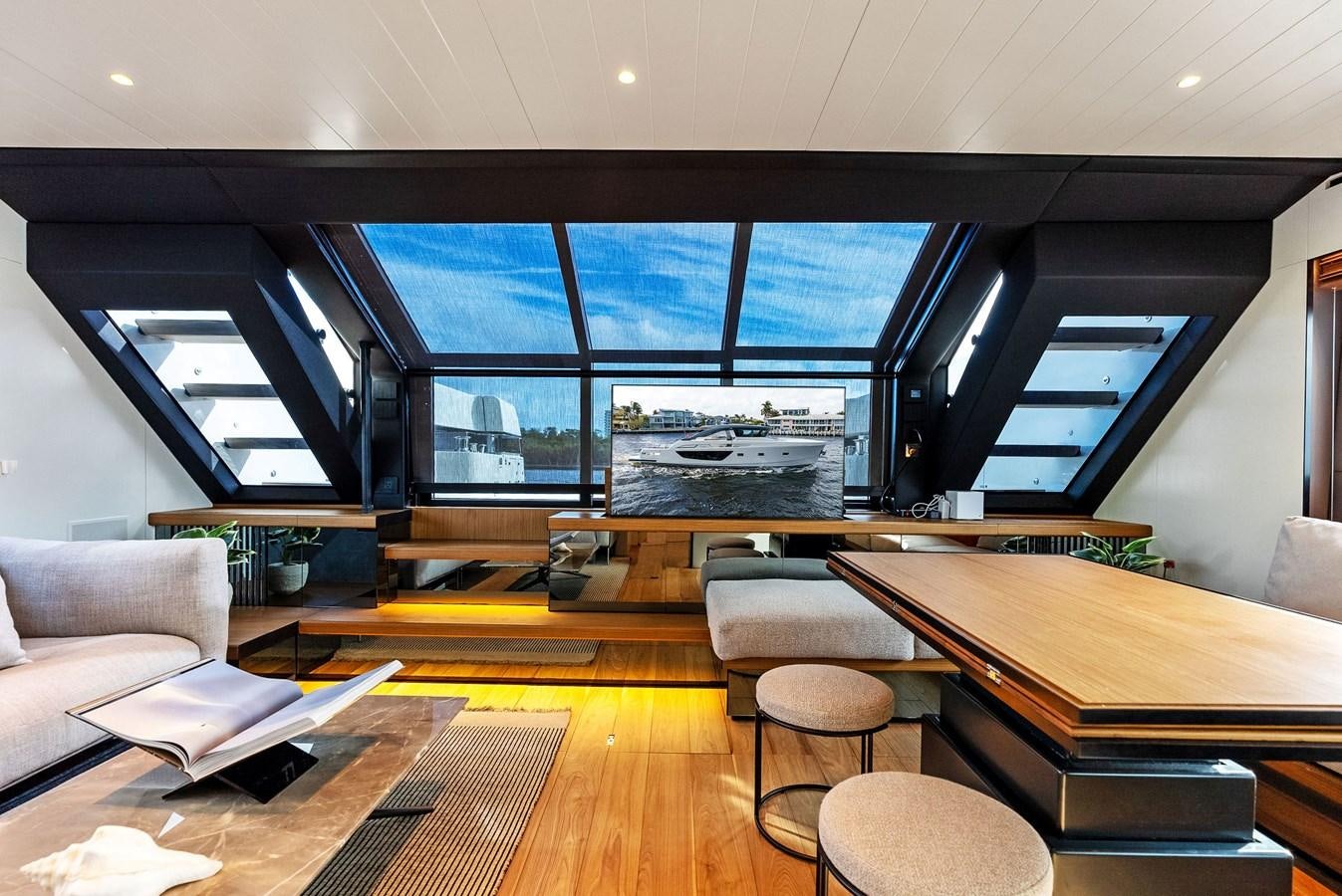 a room with a table and chairs aboard SNACK MONEY Yacht for Sale