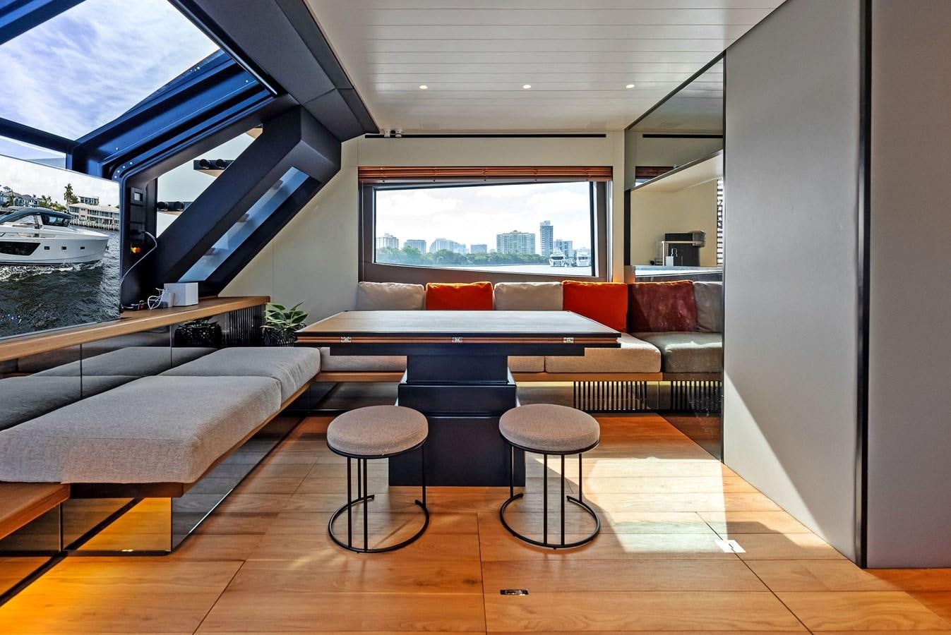 a room with a couch and a table aboard SNACK MONEY Yacht for Sale