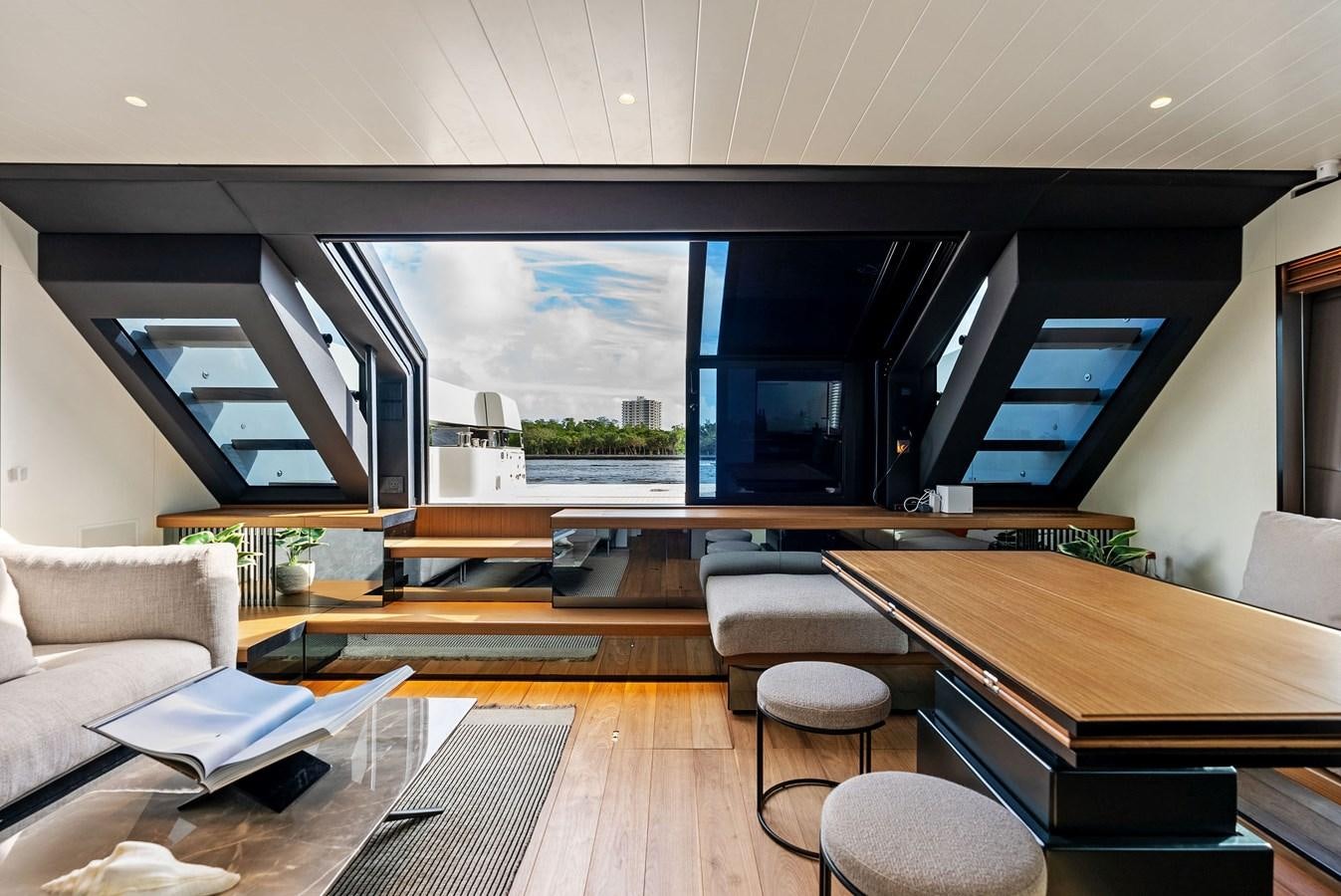 a room with a large window aboard SNACK MONEY Yacht for Sale
