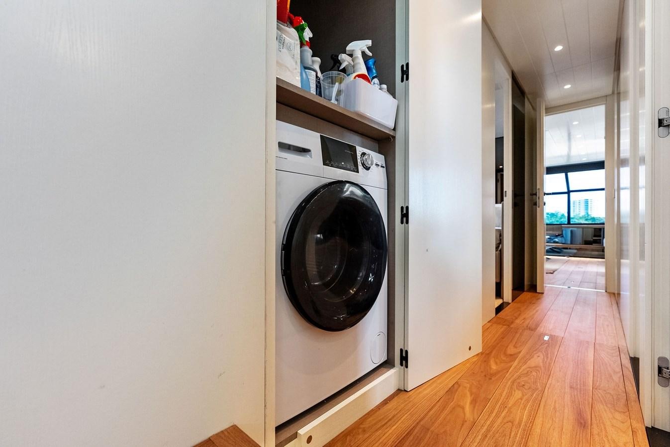 a room with a washing machine aboard SNACK MONEY Yacht for Sale