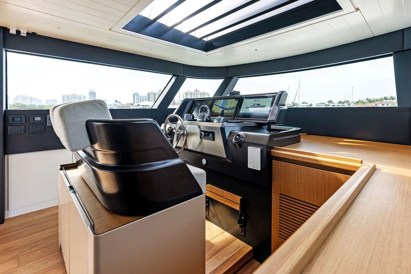 a car with a seat and a steering wheel aboard SNACK MONEY Yacht for Sale