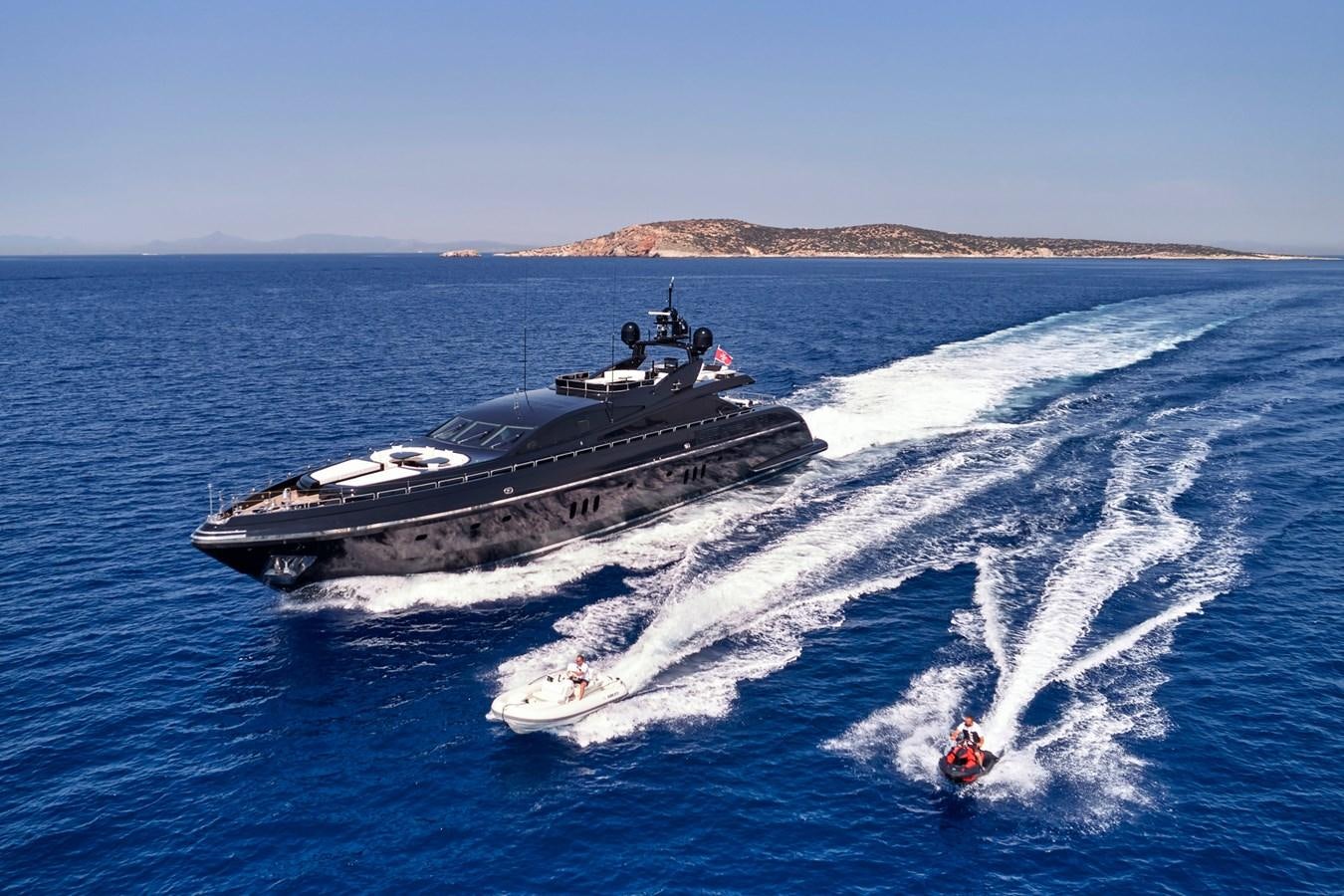 a military boat and a boat on the water aboard ABILITY Yacht for Sale