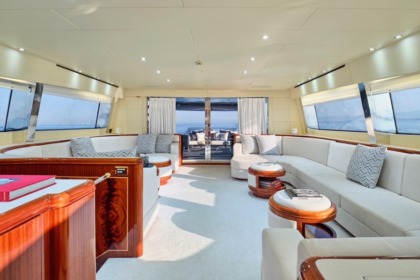 a room with a bed and a couch aboard ABILITY Yacht for Sale