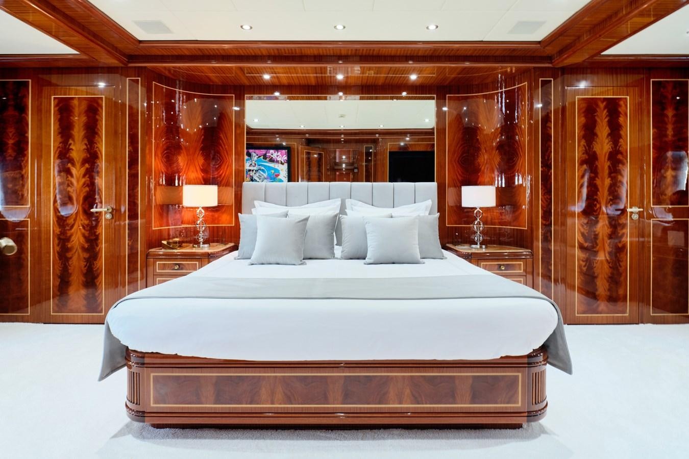 a bed in a hotel room aboard ABILITY Yacht for Sale