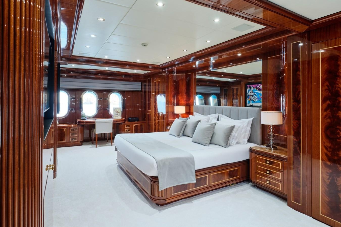 a large bed in a room aboard ABILITY Yacht for Sale