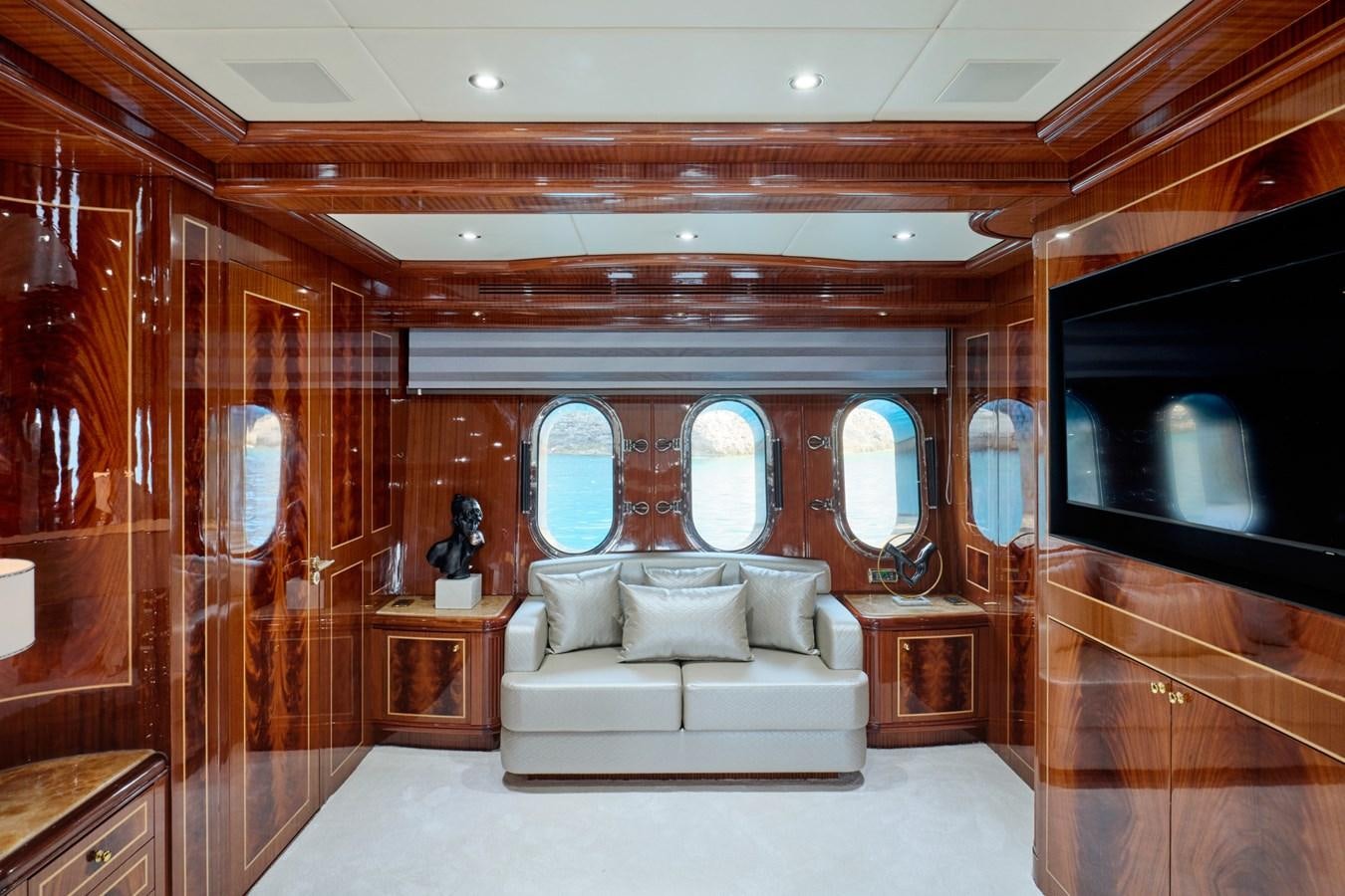 a room with a bed and a tv aboard ABILITY Yacht for Sale