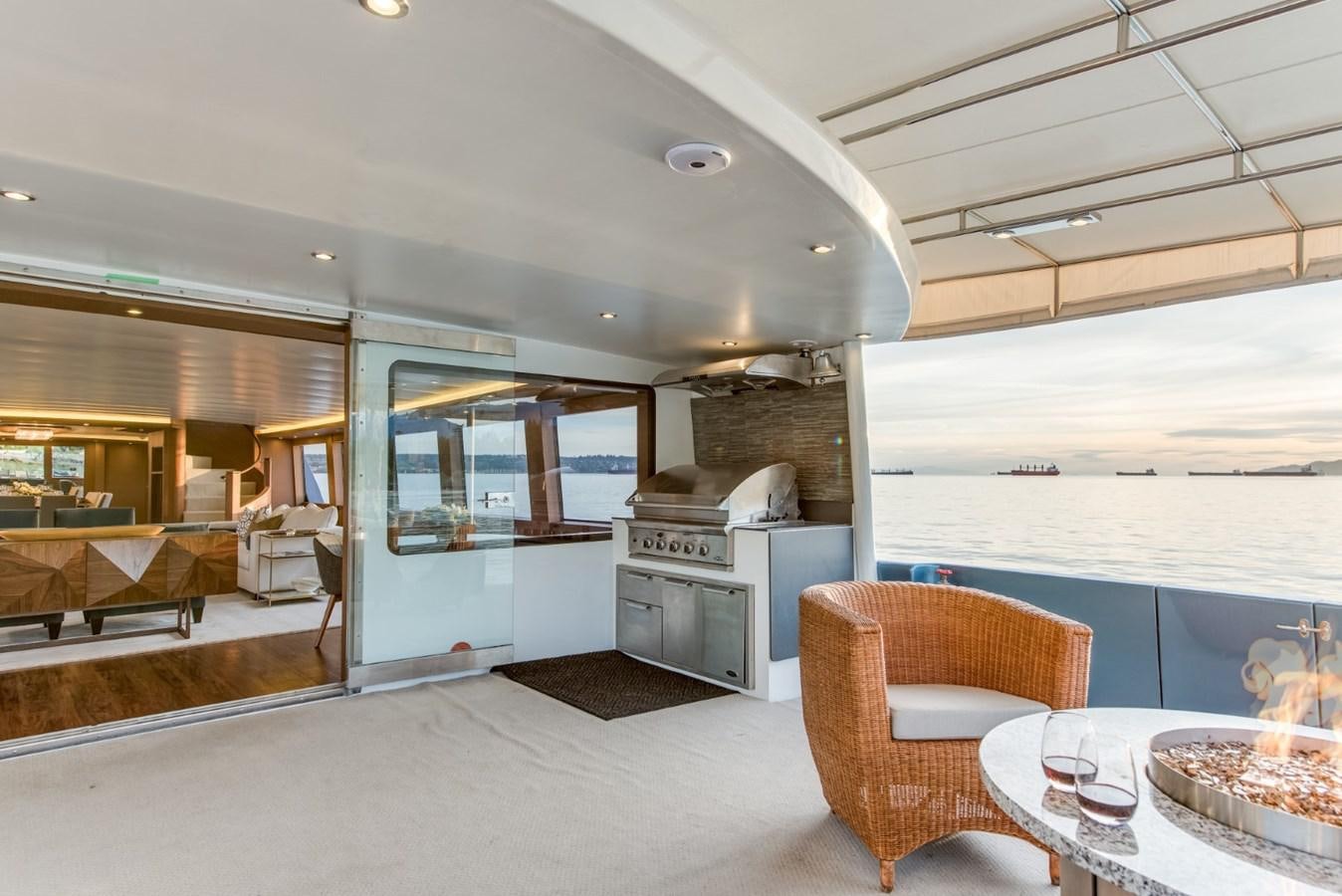 a large kitchen with a dining area aboard ASCENTE Yacht for Sale