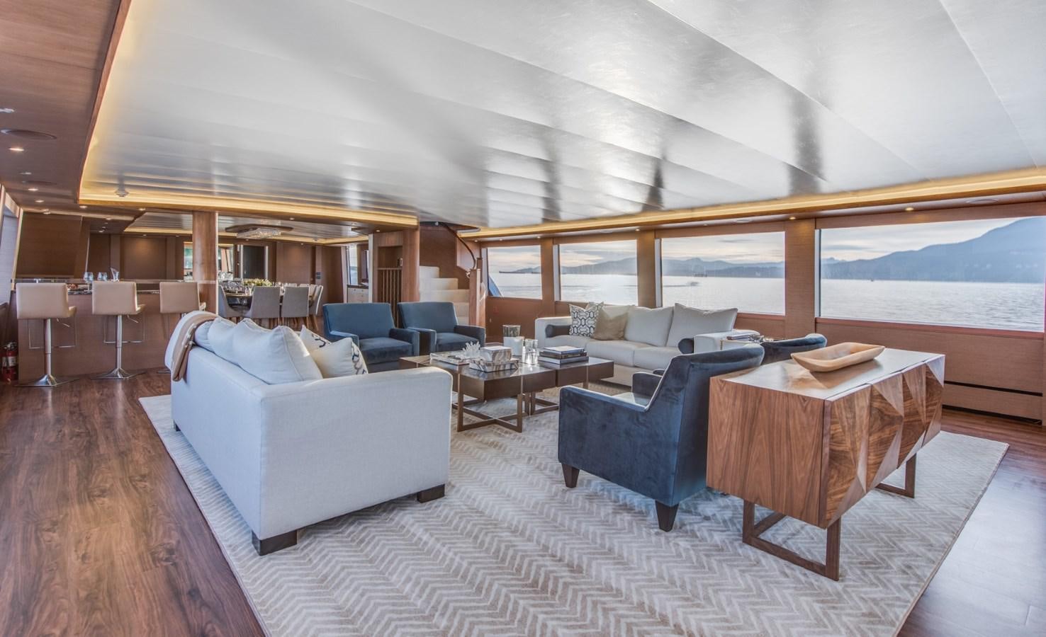 a room with a couch and a table aboard ASCENTE Yacht for Sale