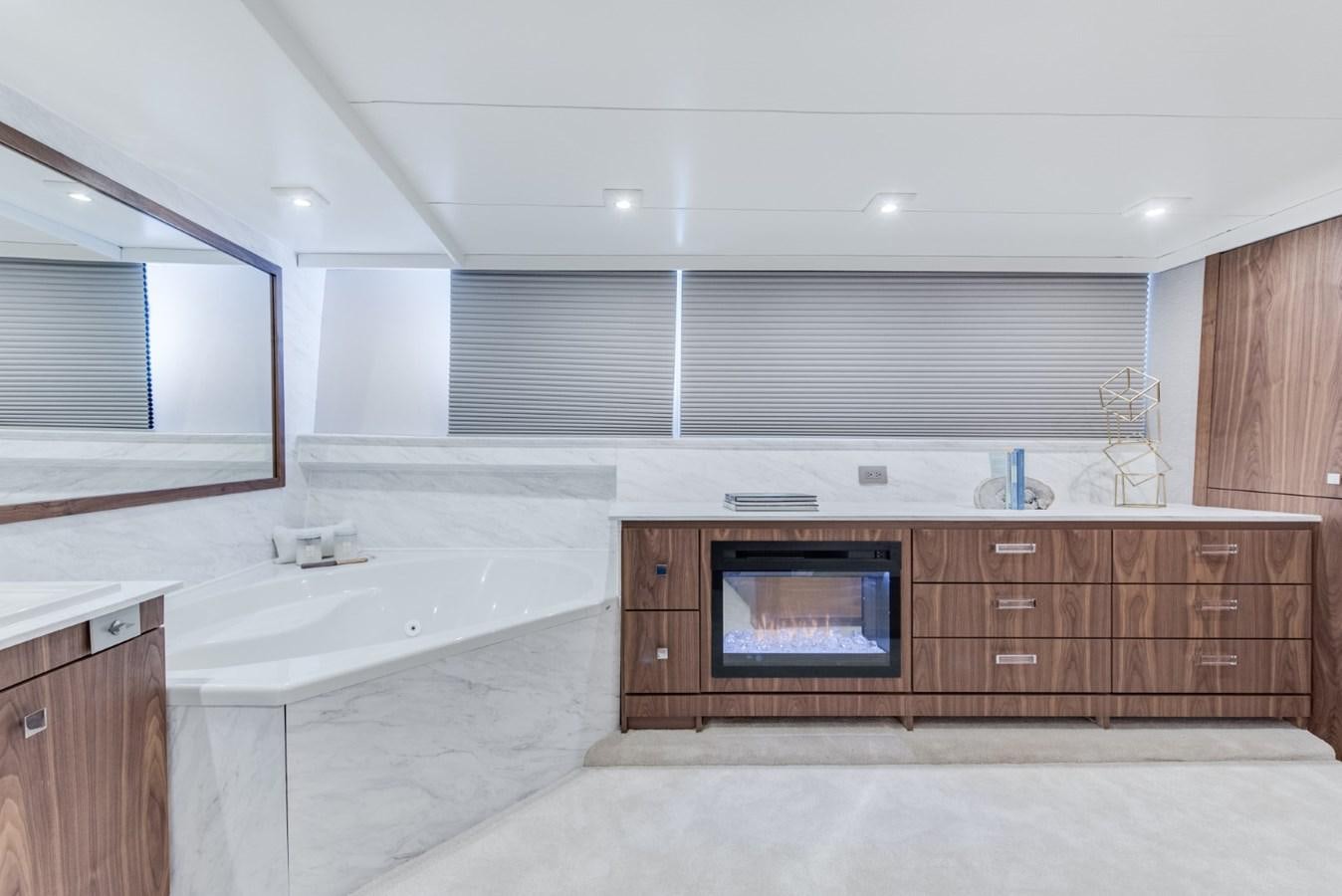 a large bathroom with a large jacuzzi tub aboard ASCENTE Yacht for Sale