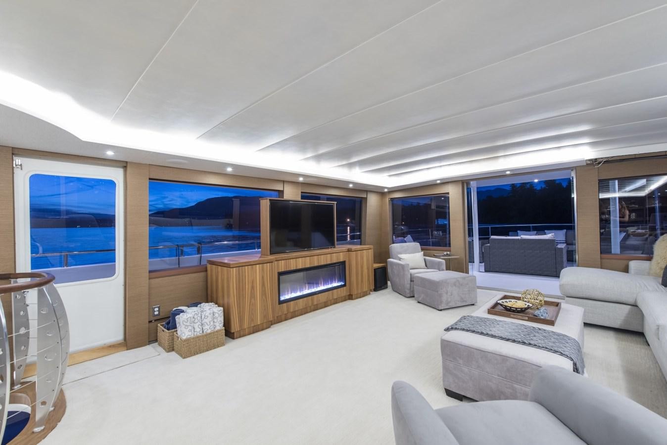 a living room with a large window aboard ASCENTE Yacht for Sale