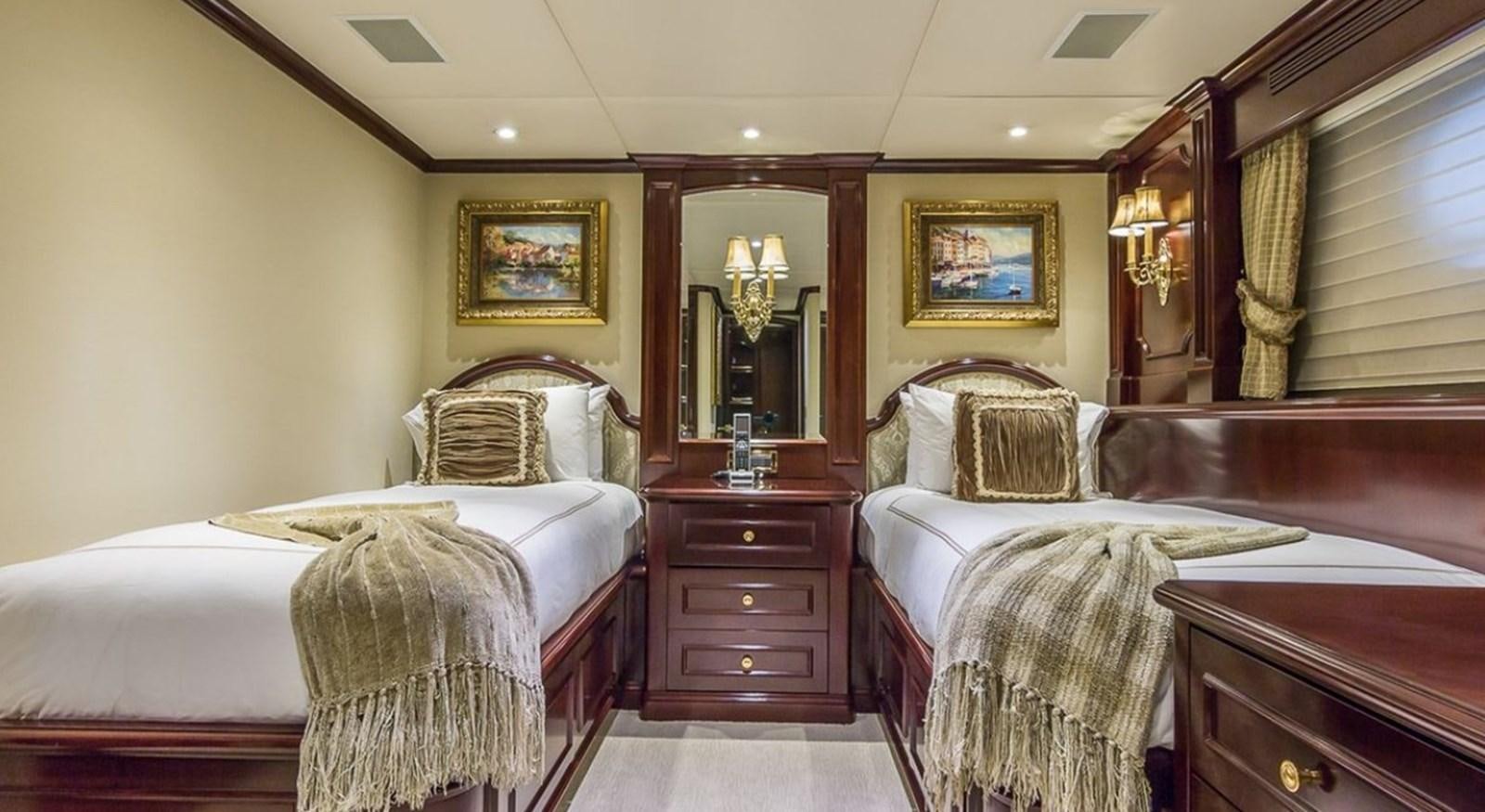 a couple of beds in a hotel room aboard TRUE LOVE Yacht for Sale