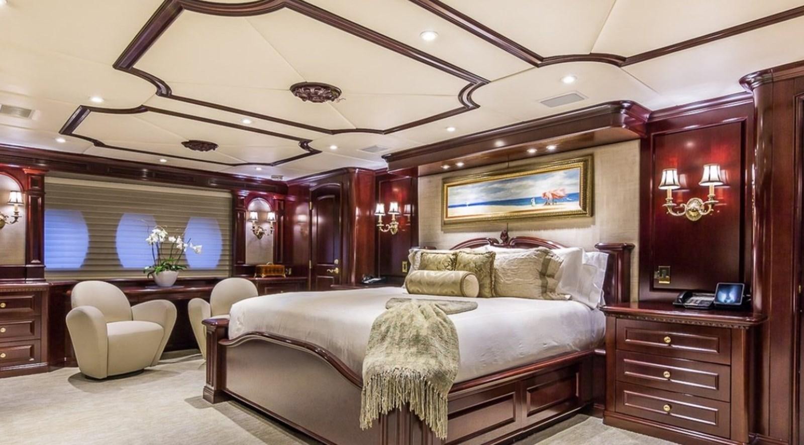 a large bedroom with a large bed aboard TRUE LOVE Yacht for Sale