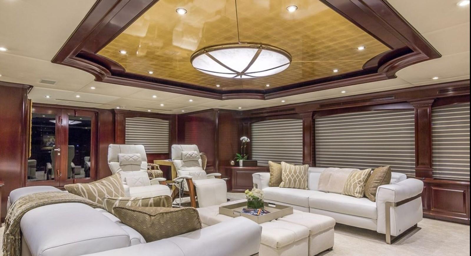 a living room with white couches aboard TRUE LOVE Yacht for Sale