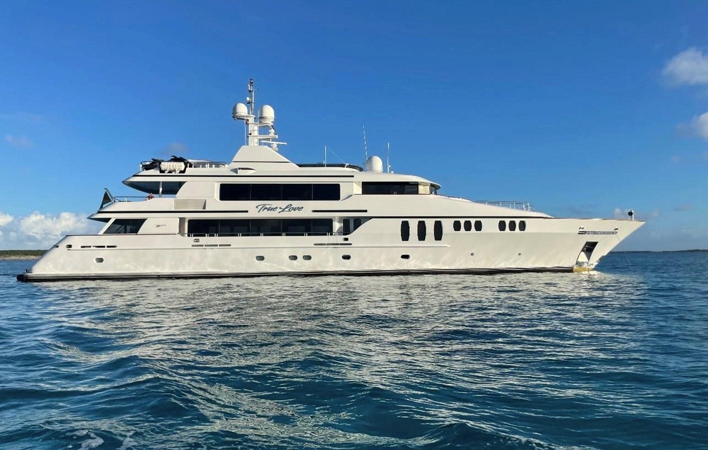 a large white ship in the water aboard TRUE LOVE Yacht for Sale