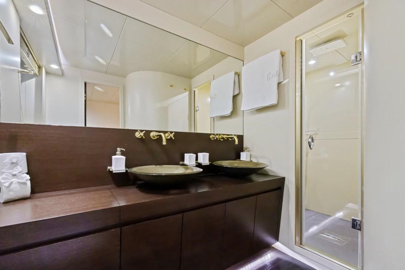 a bathroom with a sink and a mirror aboard DREAM ON Yacht for Sale