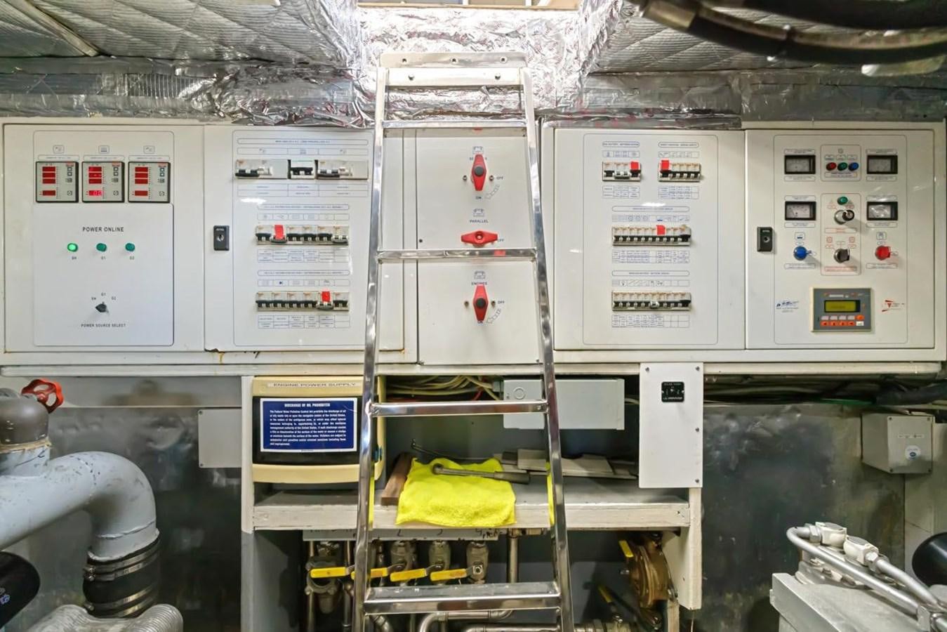 a room with equipment and shelves aboard DREAM ON Yacht for Sale