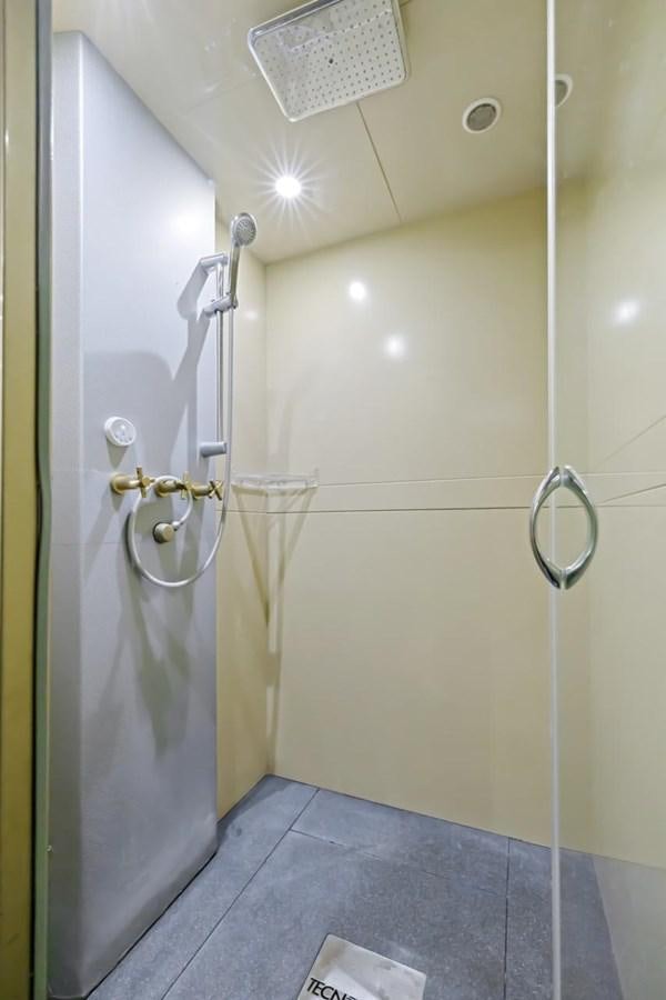 a shower with a glass door aboard DREAM ON Yacht for Sale