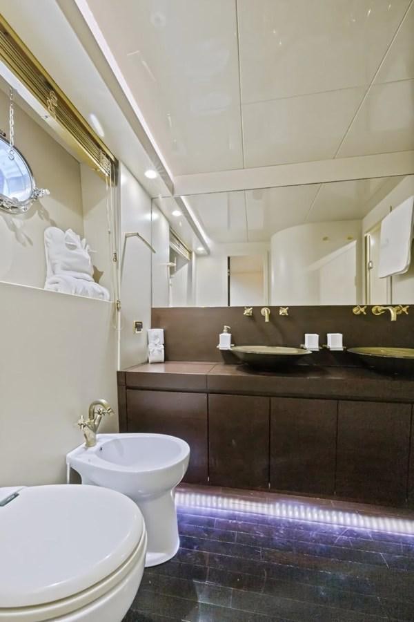 a bathroom with a sink and toilet aboard DREAM ON Yacht for Sale