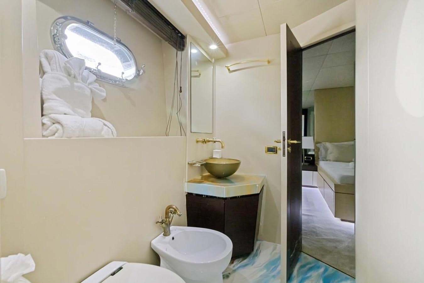 a bathroom with a sink and a mirror aboard DREAM ON Yacht for Sale