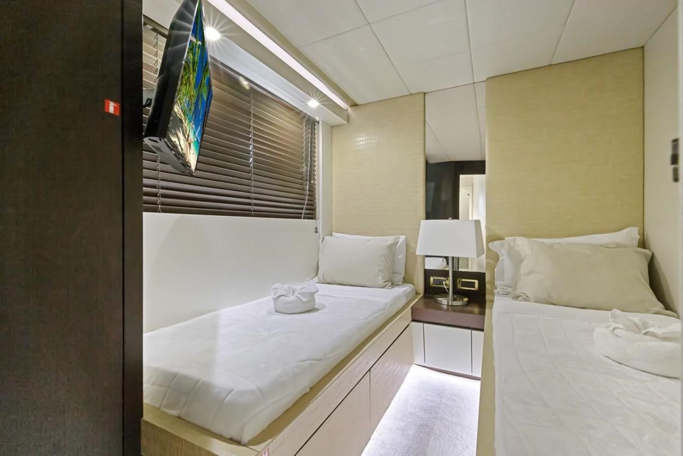 a couple of beds in a hotel room aboard DREAM ON Yacht for Sale