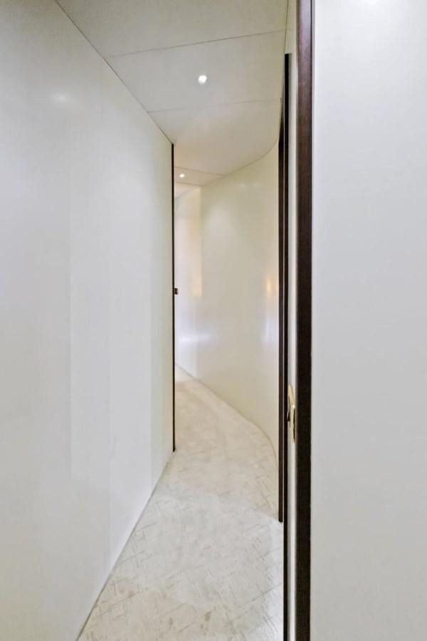 a hallway with a door aboard DREAM ON Yacht for Sale