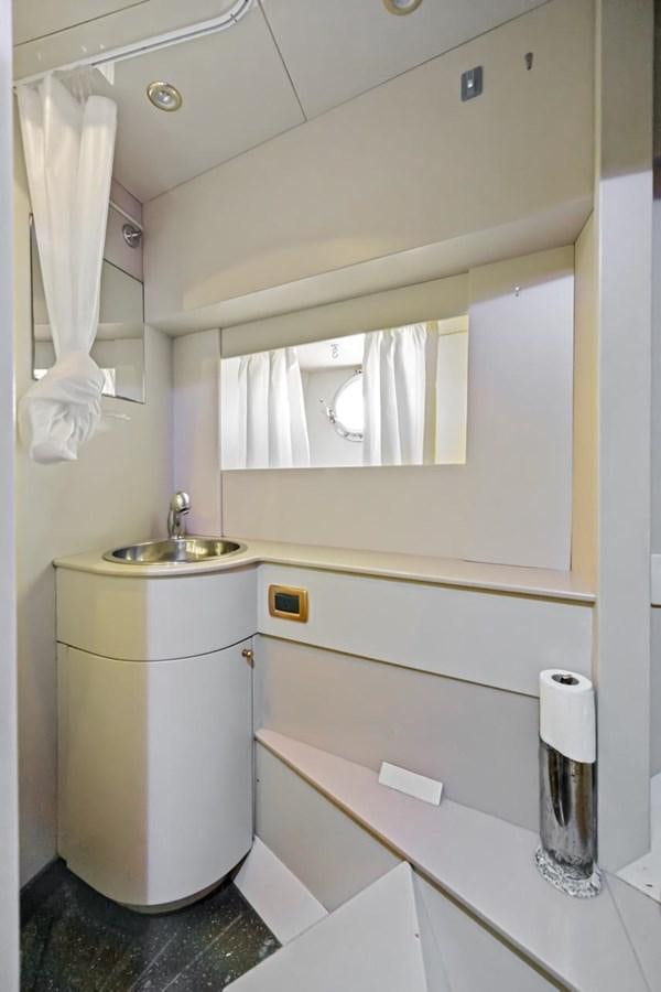 a bathroom with a sink and toilet aboard DREAM ON Yacht for Sale