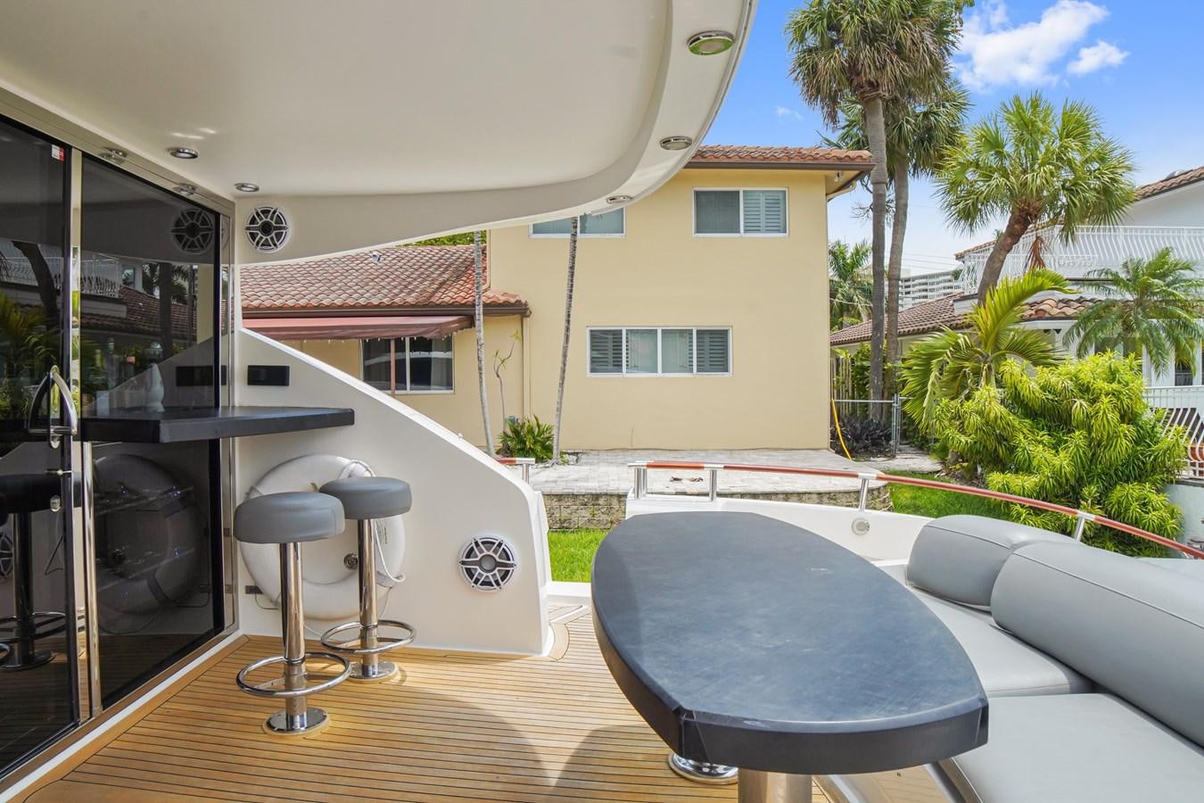 a large pool table in a backyard aboard LAZZARA 68' Yacht for Sale