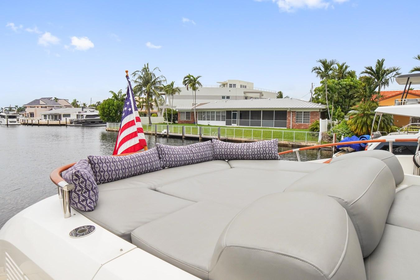 a boat on the water aboard LAZZARA 68' Yacht for Sale