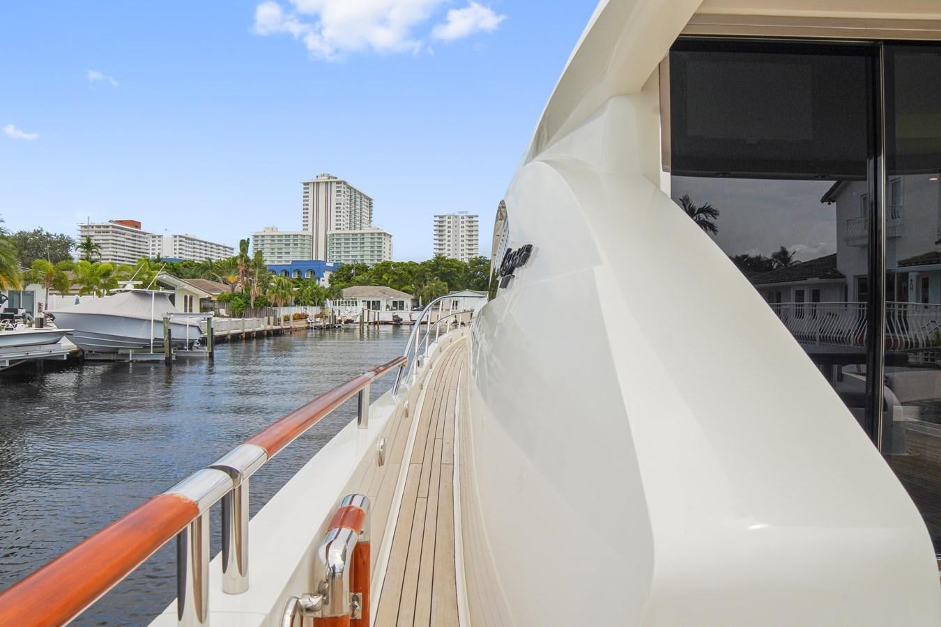 a boat on the water aboard LAZZARA 68' Yacht for Sale