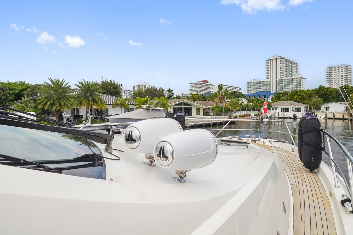a car on a bridge aboard LAZZARA 68' Yacht for Sale
