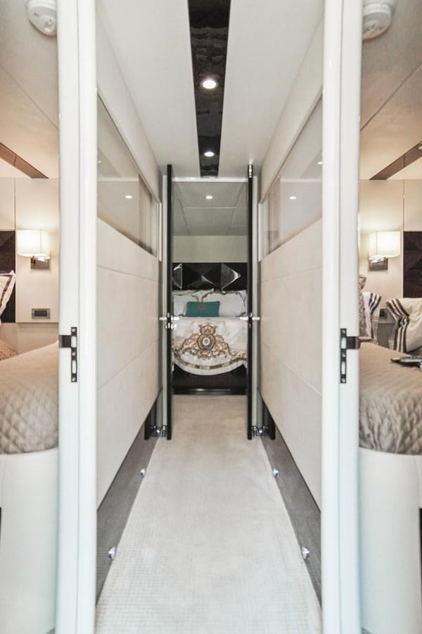 a bathroom with a large glass shower aboard LAZZARA 68' Yacht for Sale