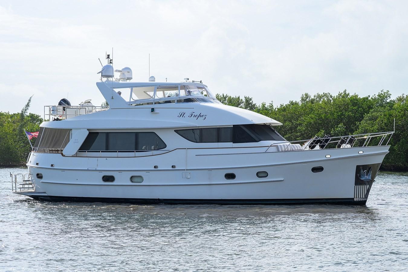 a white yacht on the water aboard ST. TROPEZ Yacht for Sale