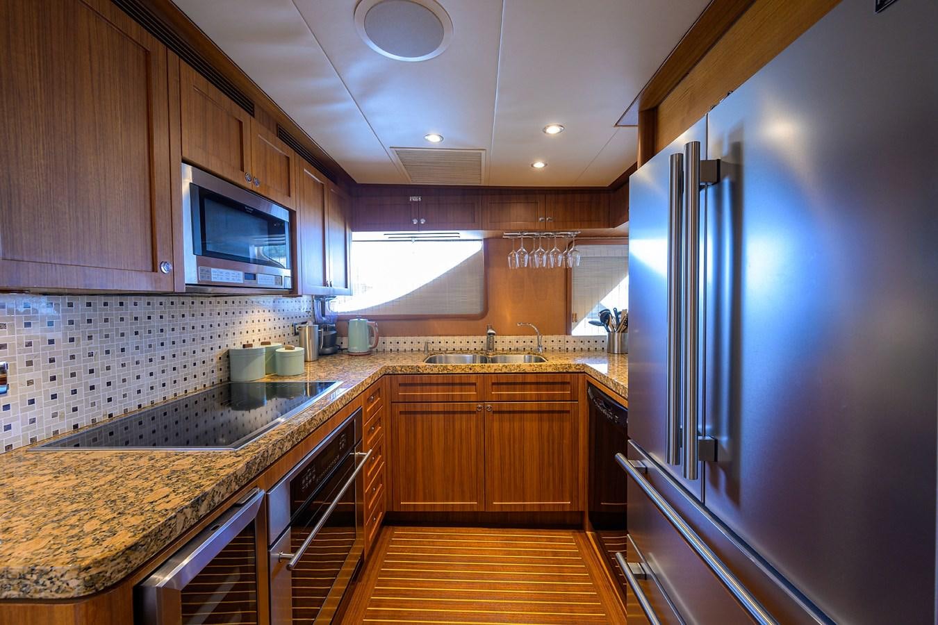 a kitchen with stainless steel appliances aboard ST. TROPEZ Yacht for Sale