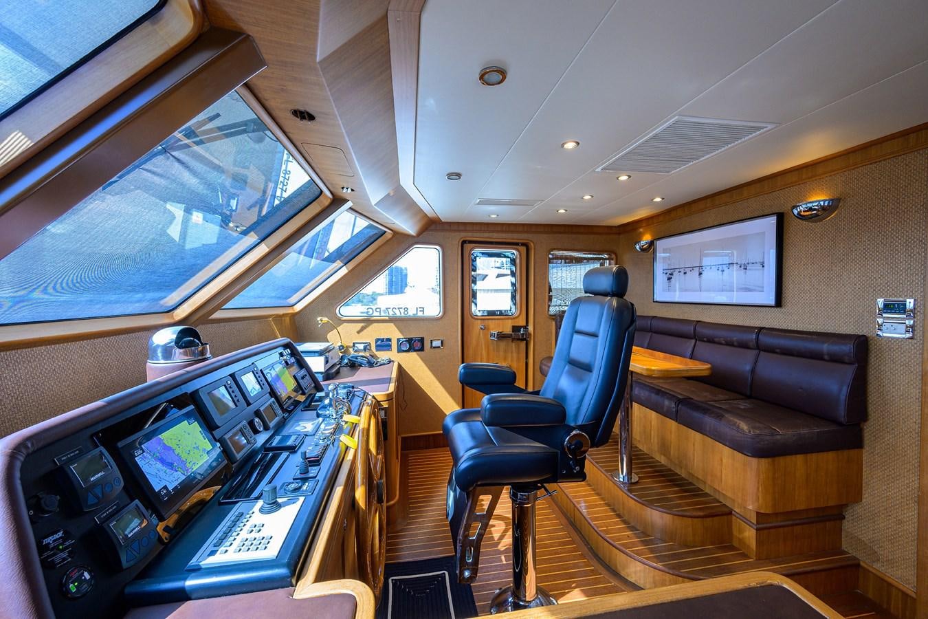 inside of a vehicle with a desk and chairs aboard ST. TROPEZ Yacht for Sale