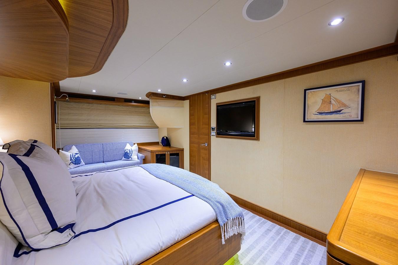 a bedroom with two beds aboard ST. TROPEZ Yacht for Sale