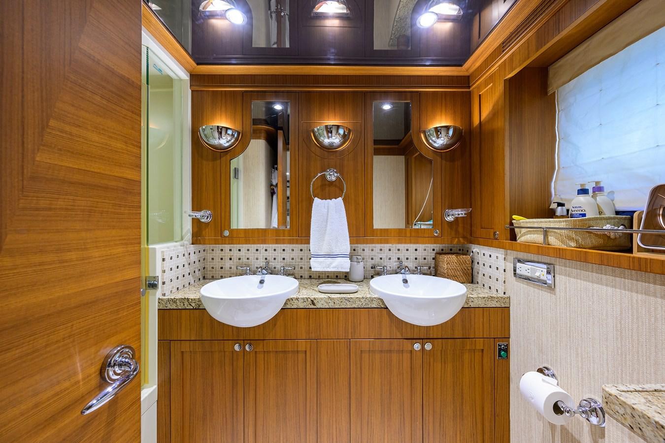 a bathroom with two sinks aboard ST. TROPEZ Yacht for Sale