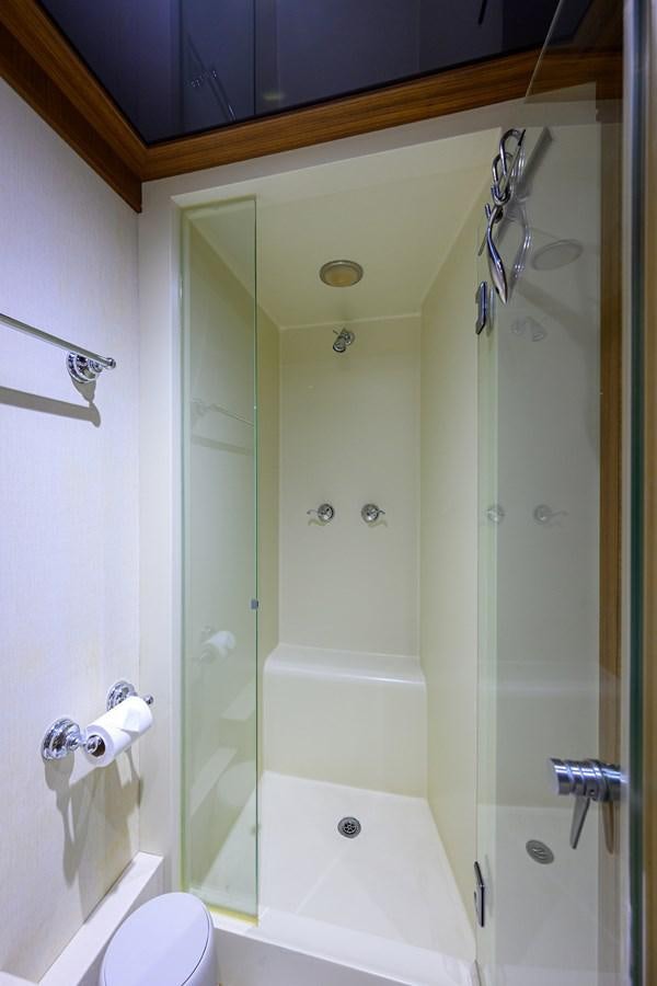 a shower with a glass door aboard ST. TROPEZ Yacht for Sale